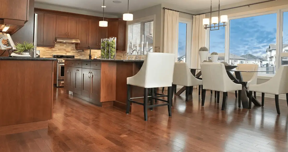 A modern kitchen with professionally installed wood flooring in Knoxville, TN
