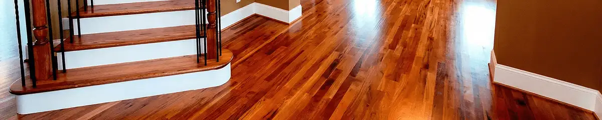 Base floor of a staircase with professionally restored wood flooring in Knoxville TN
