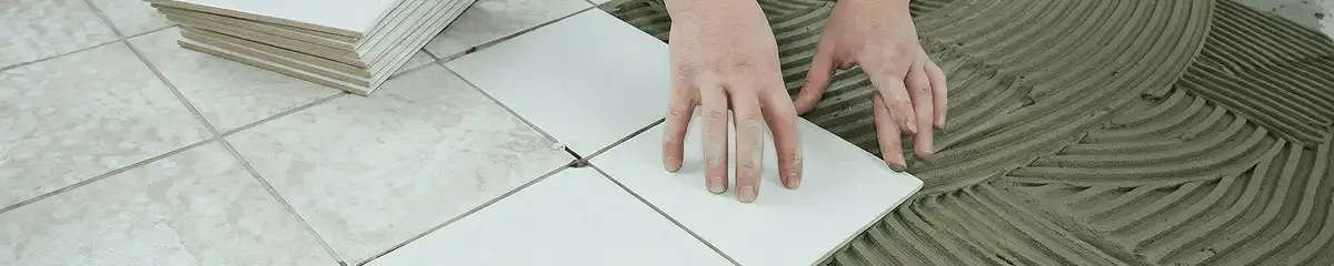 Professional installing white tile floors in Knoxville, TN